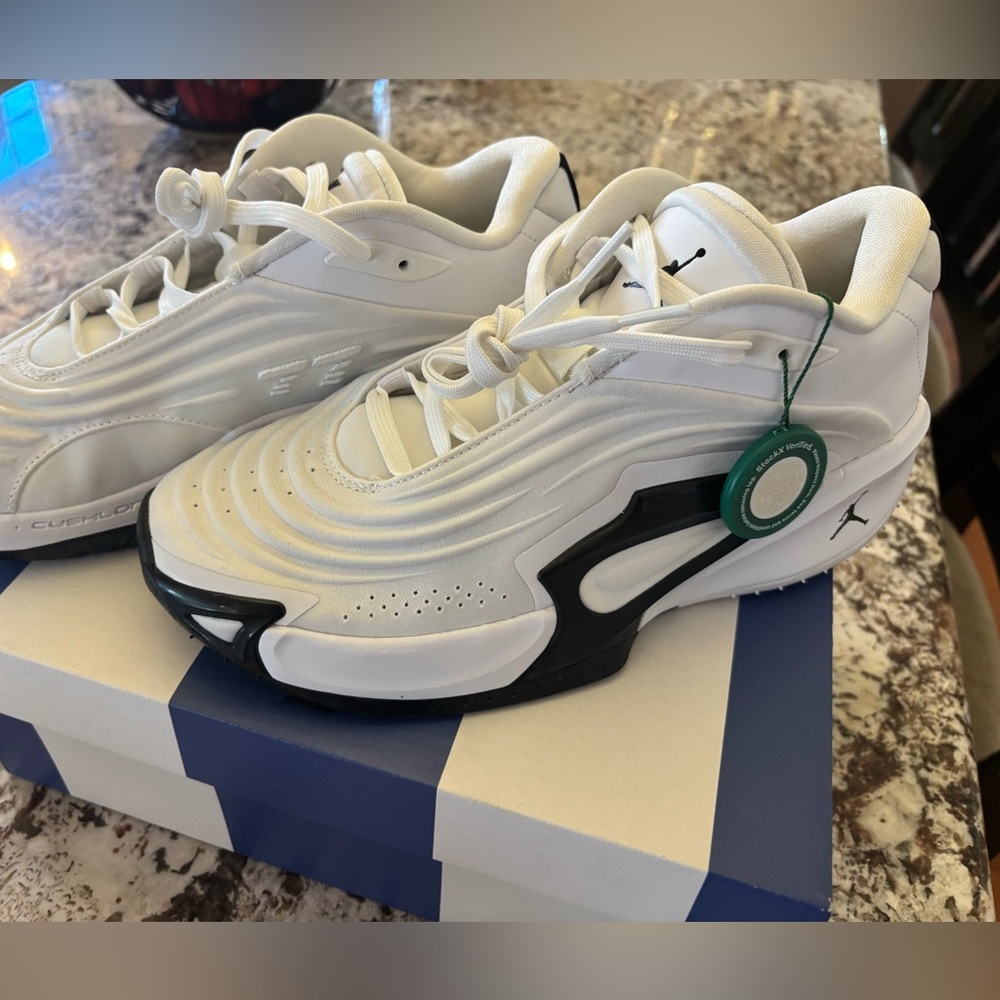 Jordan White and Black Low-Top Sneakers with Green Tag